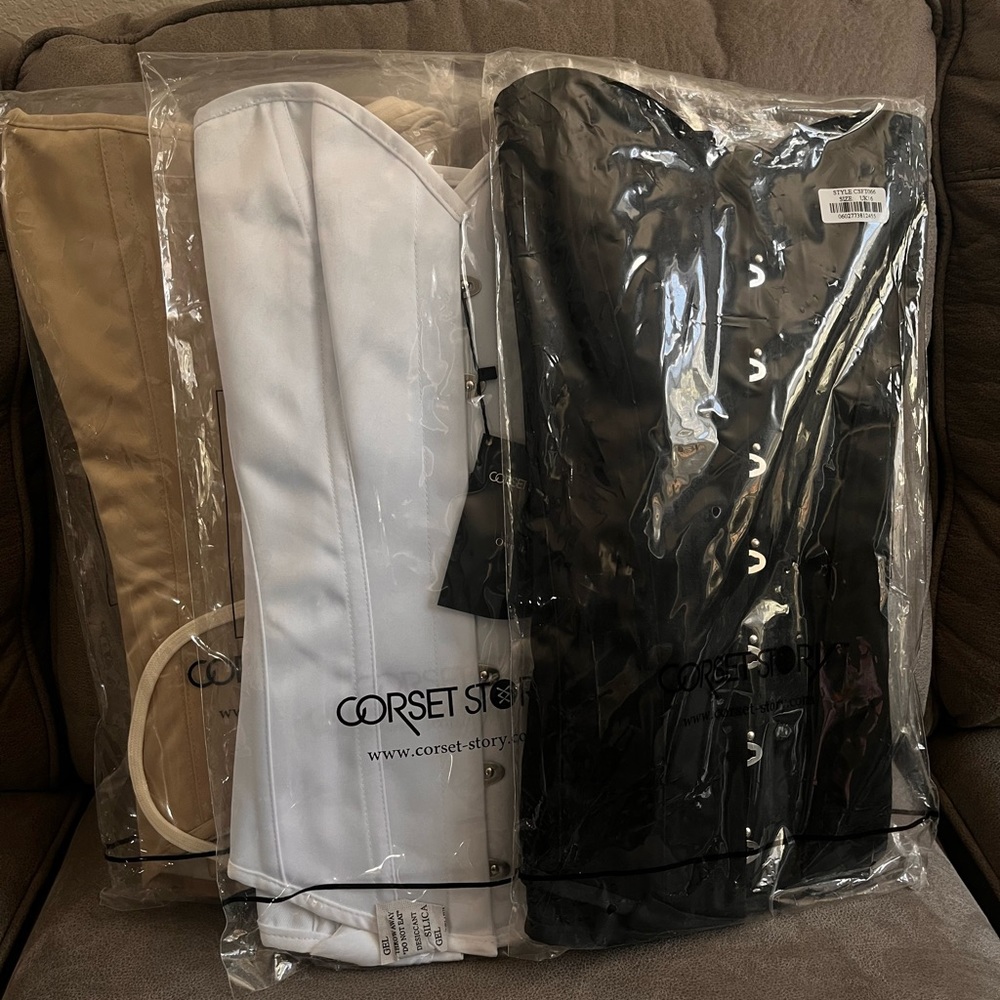 Bundle of three new Corset Story corsets in their original plastic.